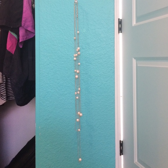 Gold color and pearl necklace