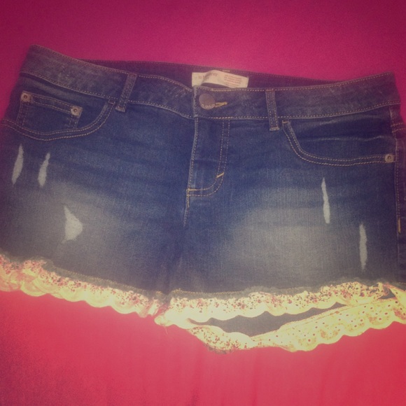 denim shorts with laced bottom.