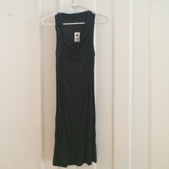 Black, swoop neck dress.