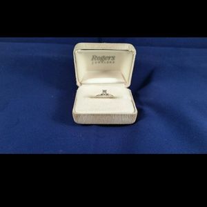 0.25 CT genuine diamond ring