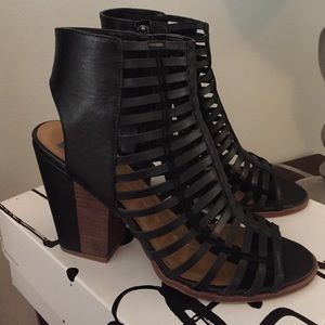 Black leather Dolce Vita gladiator heel wedges