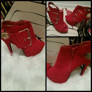 Red high heel pumps