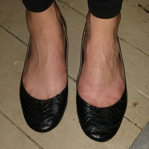 Black snakeskin ballet flats