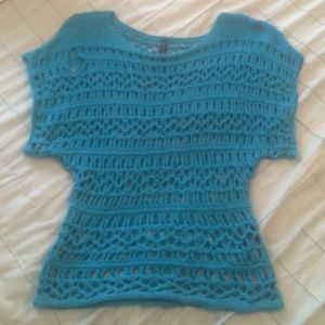 Bright blue tattered sweater top