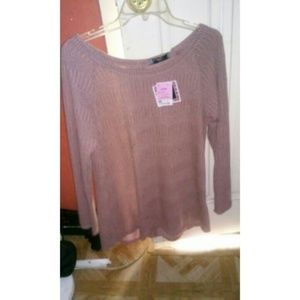 Long sleeve pink top.