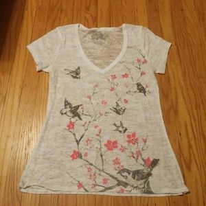 White shirt with tree and bird design