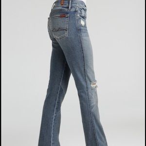 Seven for all mankind destroyed denim flares.