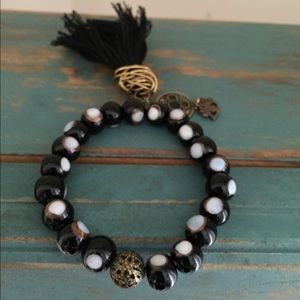 Evil eye w/gold accents & tassel