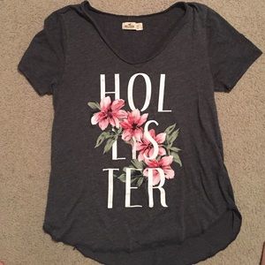 Grey hollister top with pink floral and logo