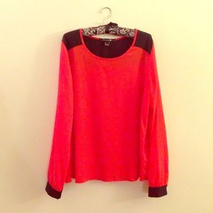 Black and orange long sleeve career dress shirt.