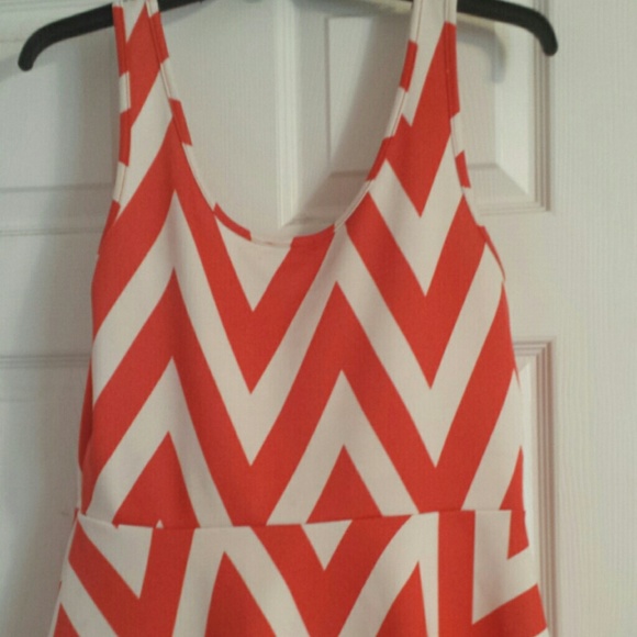 Orange and cream peplum top