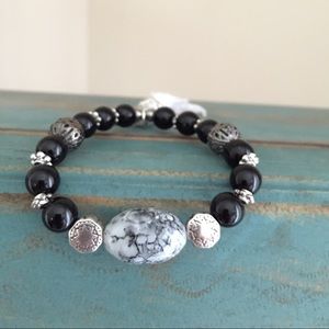 Black/white marble, silver accents, tassel