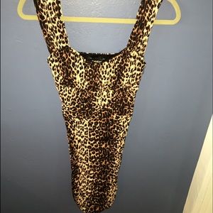 Cheetah print bebe dress.