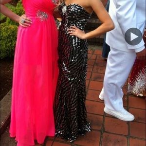 Selling the black and silver strapless dress