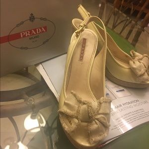 Authentic Prada wedge sling back heel w/ bow front