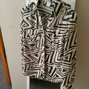 Long sleeve button up blouse.
