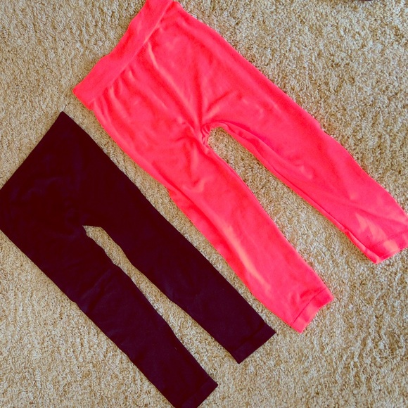 2 pair of leggings. Neon pink and black