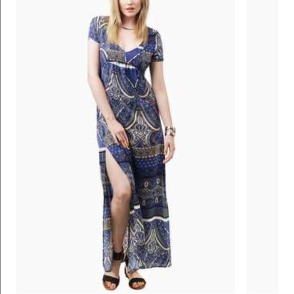 Cut out back maxi dress with high split.