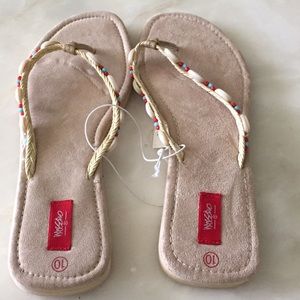 Mossimo flip flops adorned with shells
