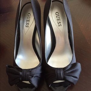 Guess satin peep toe with bow pumps. Great buy!
