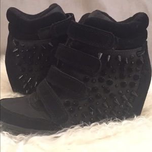 Black studded sneaker wedges from Aldo!