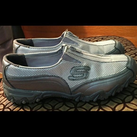 Grey and silver skechers