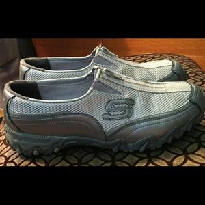 Grey and silver skechers