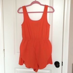 Mink Pink brand orange romper