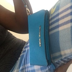 Authentic Michael Kors wristlet iPhone 5 fits