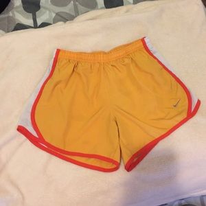 Nike orange running shorts