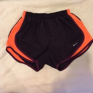 Nike dark purple/neon orange running shorts