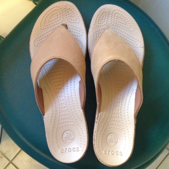 Never worn tan crocs wedge sandals.