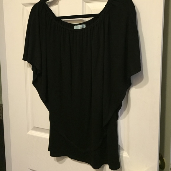 Black shirt off shoulder or on
