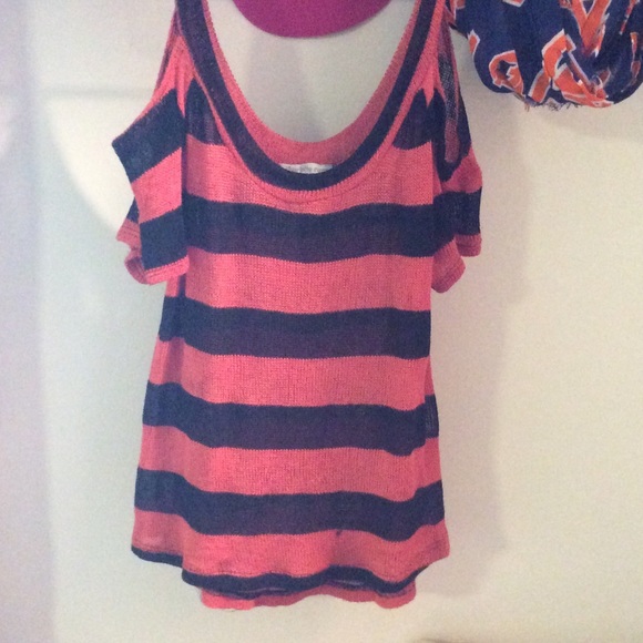 Orange and blue sweater with cold shoulders