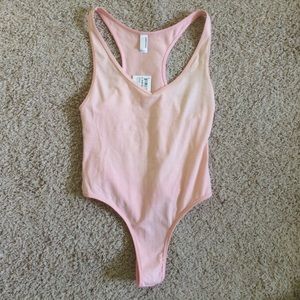 Light pink American Apparel bodysuit