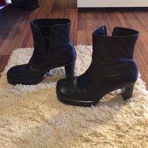 Black heeled boots with zipper on side