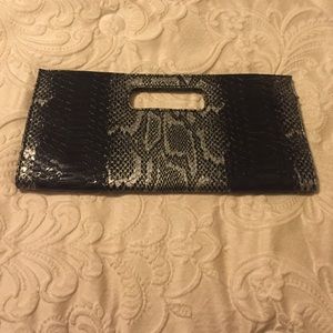 Giannini snake skin clutch
