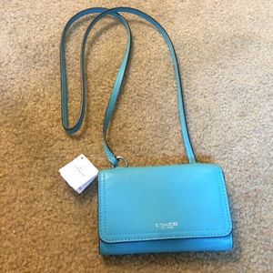 SOLD!!!! Coach turquoise phone crossbody bag