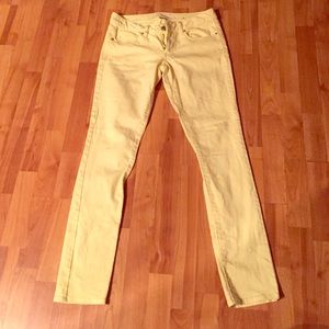 American Eagle bright yellow skinny jeans.