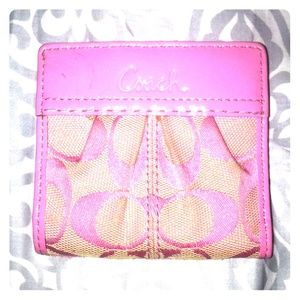 Pink coach wallet.