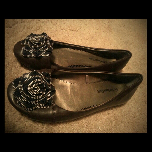 Brown and black floral flats