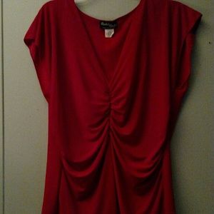 Slimming red blouse. Excellent condition.