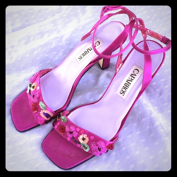 Fushia color sandals with sequence and beads.