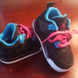 Black blue Jordan's with pink laces
