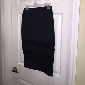 Knee length black skirt