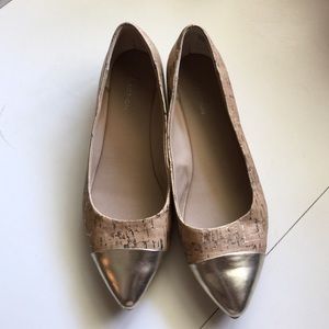 Gold tipped flat shoe