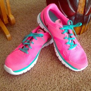 Pink and mint green Nike fit sole