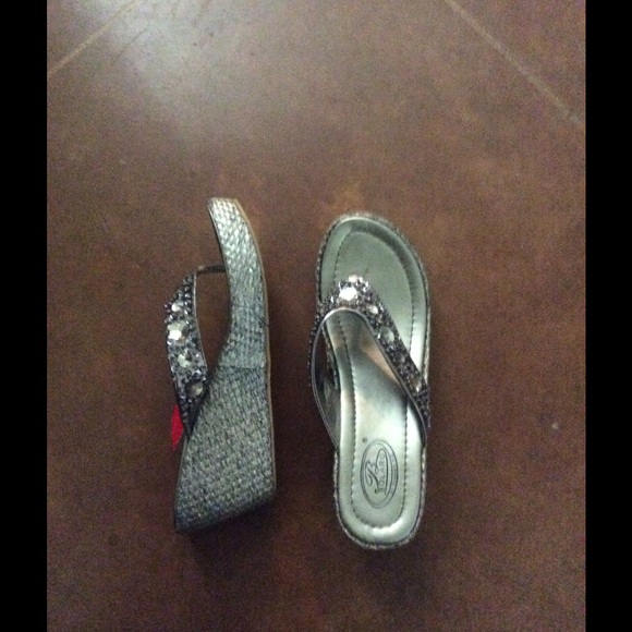 Silver wedge flip flops
