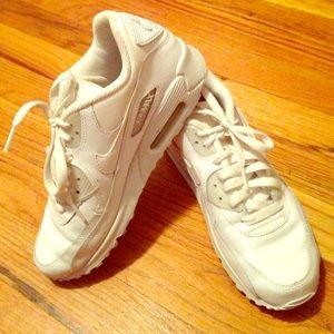 All white Nike Air Max sneakers