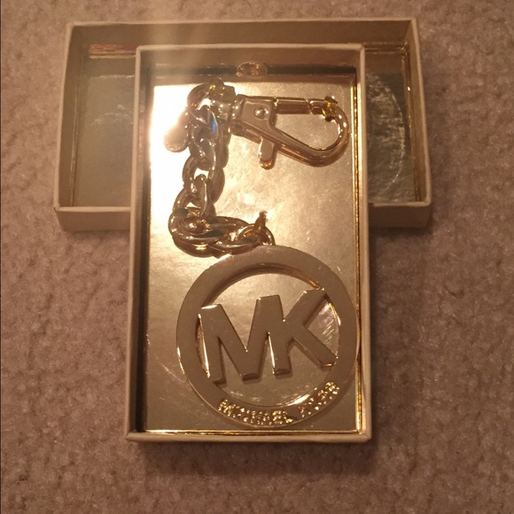 Gold Michael Kors keychain/charm